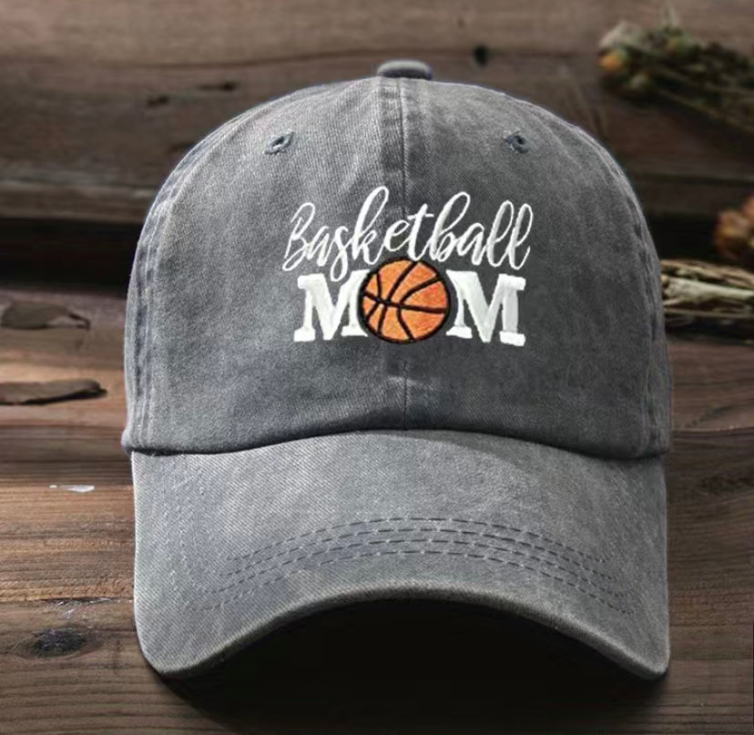 Basketball Mom, Hat, Gray, Baseball cap, Sports, Team spirit, Game day, Supportive, Comfortable, Adjustable strap, Embroidered detail, Modern, Stylish, Fashionable, Athletic wear, Casual, Sporty, Sideline style, Parent pride, Basketball season